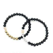 Load image into Gallery viewer, Black Onyx Howlite Skull bracelet